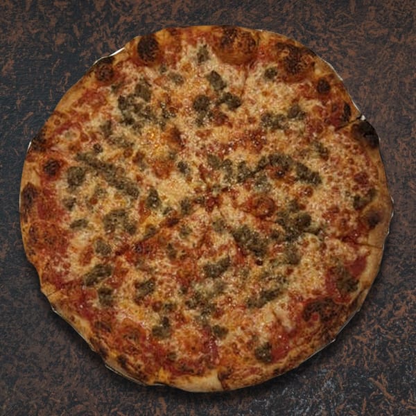 A whole, round pizza with melted cheese and crumbled sausage on a dark, textured surface.